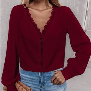 Burgundy lace inert trim long sleeve blouse